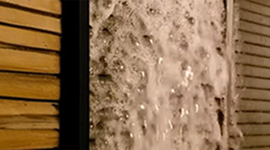 Enzyme+36 coil cleaning process showing foamy solution penetrating HVAC coils, emphasizing eco-friendly and effective microbial removal for improved air quality.
